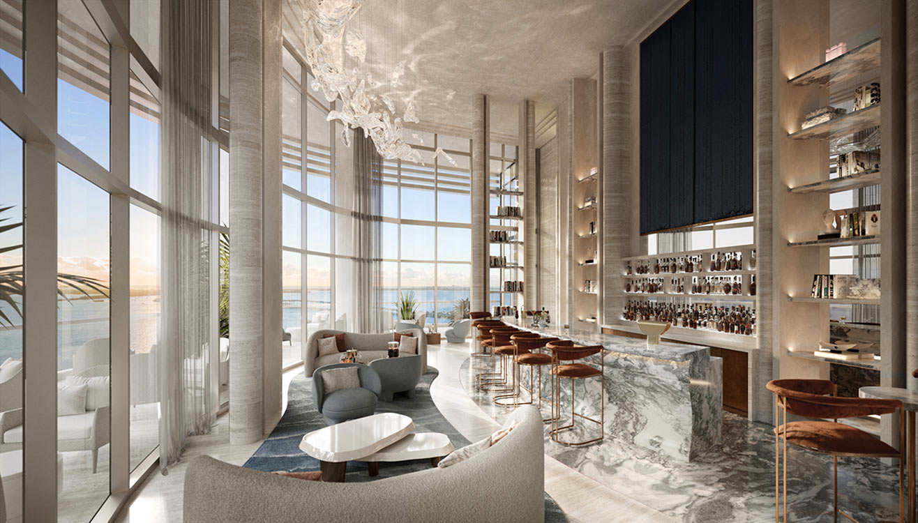 St. Regis Residences private library bar lounge with curated book collection